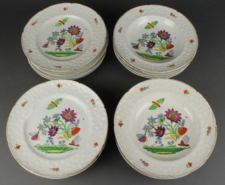 A 19th Century part dinner service decorated with insects amongst flowers comprising 8 soup bowls, 11 dinner plates, all are chipped and cracked 