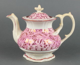 A Victorian lustre baluster teapot with scroll handle 