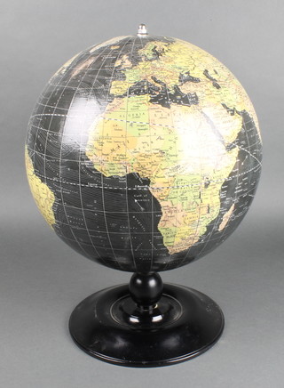 A Geographia 30.5cm present day globe, raised on an ebonised socle base 