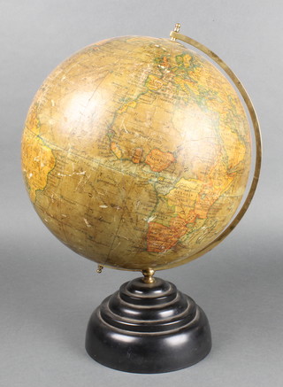 A Geographia 10" terrestrial globe, raised on a black socle Bakelite base 