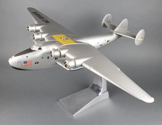 A model of a Boeing 314 Clipper flying boat 24", raised on a chrome base marked AM2011 no. 7803