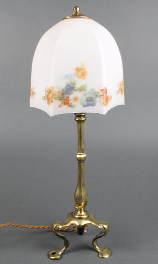 A vintage brass Pullman lamp with hexagonal opaque glass shade  