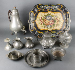 A Toleware style tray painted flowers 16" x 20", a Continental pewter tea urn 14", ditto cylindrical urn and cover 9", circular Continental pewter dish 9", ditto plate 7" and other items of pewter
