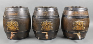 3 faux coopered sherry barrels marked Gilbeys Vintage
