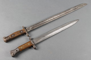 A Wilkinson 1894 Mk1 Type 2 Lee Mitford bayonet (no scabbard) together with a Wilkinson's 1907 bayonet (reduced in length, no scabbard) 