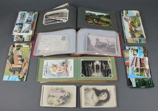 3 small albums of various postcards together with a collection of loose postcards 