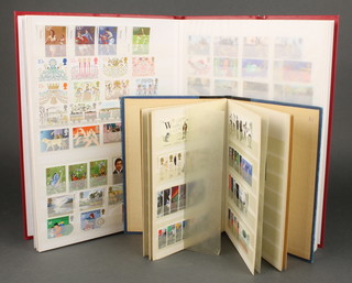 A stock book containing GB QEII definitive and commemorative issue stamps and 1 other stock book  