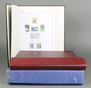 3 albums of mint and used stamps - Abu Dhabi, Albania, Angola, Kazakhstan, Kyrgyz, Australian Antarctic Territory 1957-2001 