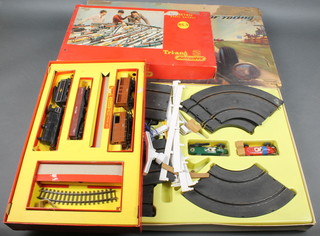 A Maycraft Champion motor racing game, a Triang model train set RS.5 and 1 other RS.6, 2 transformers etc 