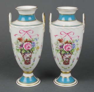 A pair of Minton Rose Basket 2 handled vases decorated with flowers No 2505 and 2915 8 3/4"