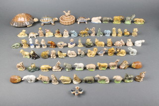 A good collection of Wade figures including from The Wild Animal Series, Tortoise family, Flintstone, Circus, etc 