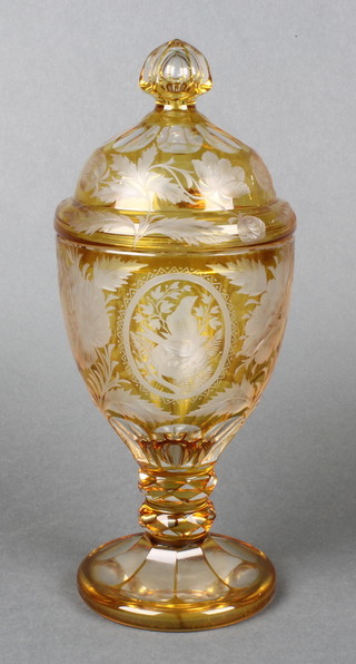 A 19th Century flash glass vase and cover, the yellow ground with panels of birds amongst flowers 11" 