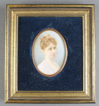 A miniature watercolour, an oval portrait study of a young lady 3" x 2" 