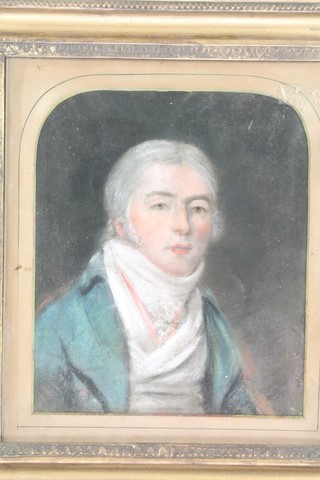 A 19th Century pastel portrait of a gentleman in a domed cut mount 10" x 8" 