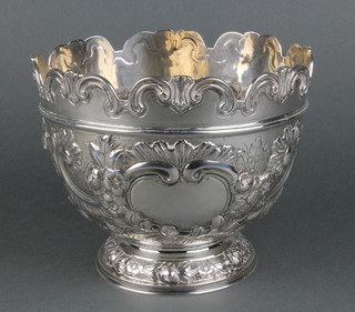 A Victorian repousse silver Monteith decorated with scrolls and flowers, London 1900 5" 