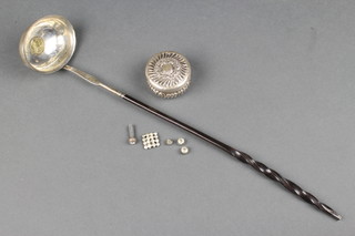 A Georgian silver and whale bone punch ladle together with a Victorian repousse silver pill box, Birmingham 1897