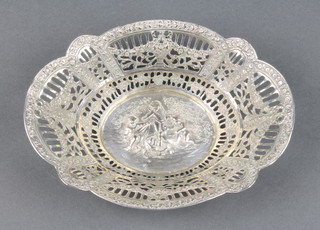 A Continental 800 silver pierced and repousse bowl decorated with cavorting cherubs, 97 grams