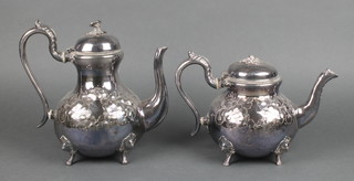 A repousse silver plated tea and coffee pot 