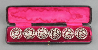 A set of 6 Victorian pierced silver floral buttons Birmingham 1900