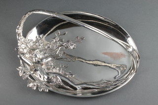 An early 20th Century WMF silver plated repousse basket decorated a figure of a semi-clad reclining figure beneath a  rose bush, stamped 400, 10" 