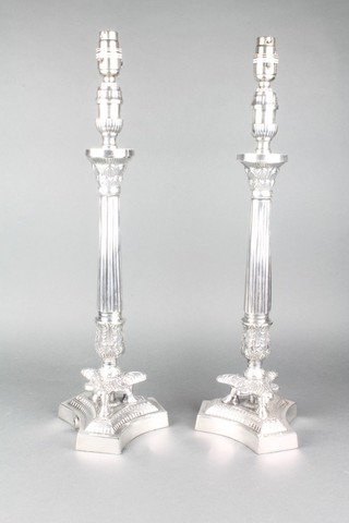 A pair of silver plated  Empire style table lamps on hoof feet with trefoil bases 20" 
