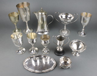 A stylish Hukin and Heath silver plated coffee pot, minor trophy cups etc 