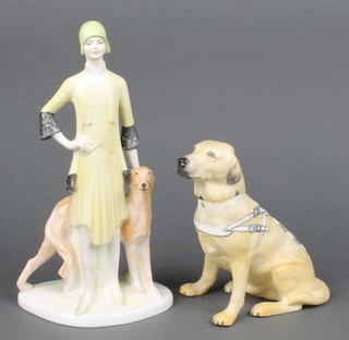 A Coalport figure of a guide dog Juno 6" together with a ditto figure Ladies of Fashion Miss 1928 9" 