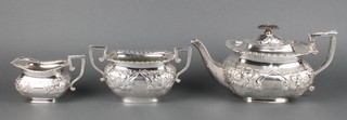 A Victorian silver plated bulbous 3 piece tea set with repousse decoration 