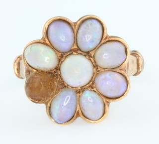 A Victorian yellow gold and opal dress ring with 8 x 9 stones, size K