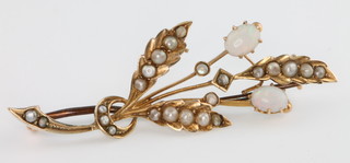 A 9ct yellow gold opal and seed pearl floral brooch 