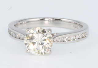 An 18ct white gold brilliant cut diamond ring approx. 1.19 ct with a diamond set shank size L 1/2