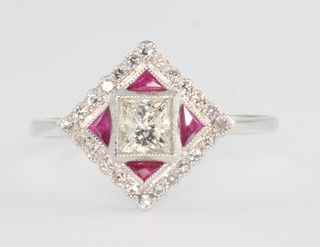 An 18ct white gold ruby and diamond Art Deco style ring, size N 