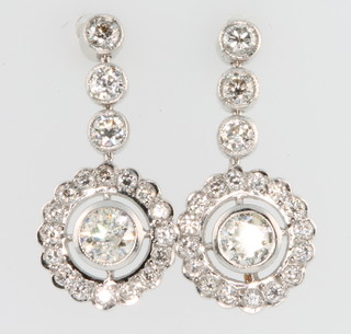 A pair of 18ct white gold and diamond Edwardian style drop earrings, approx. 1.6ct