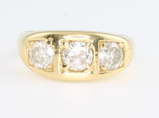 An 18ct yellow gold 3 stone diamond ring, approx. 1.5ct, size R