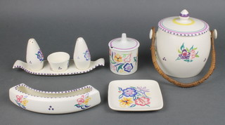 A 1970's Poole Pottery biscuit barrel decorated with flowers 7", a ditto preserve pot and lid, a square dish, posy holder and 4 piece condiment