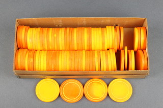 95 yellow stained ivory circular casino chips made for the Shanghai Municipal Casino in the 1930's 1 3/4" 
