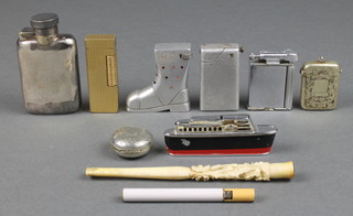 An aluminium novelty cigarette lighter in the form of a boot 2", a Dunhill engine turned gilt ditto, minor curios 