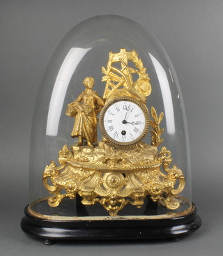 A 19th Century French timepiece with enamelled dial and Roman numerals contained in a gilt spelter case surmounted by farming trophies and complete with glass dome