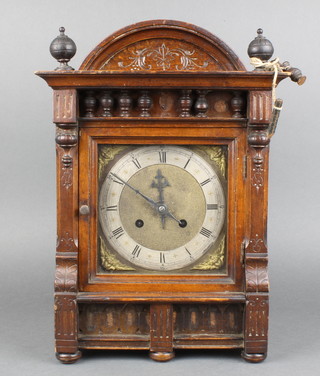 A 19th Century Continental 8 day striking bracket clock with 7" gilt dial with silvered chapter ring, contained in a walnut case 