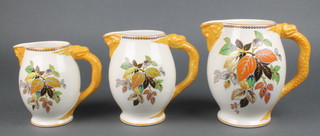 A set of 3 graduated Losol Ware jugs with autumnal leaves 7", 6" and 5" 