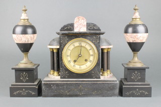 A Victorian French 3 piece clock garniture comprising a striking mantel clock with Roman numerals contained in a 2 colour marble architectural case together with 2 side urns  