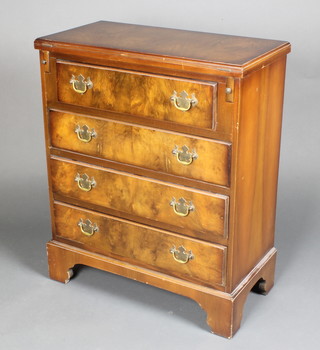 A Georgian style walnut Bachelor's chest of 4 long graduated drawers, raised on bracket feet 30"h x 24 1/2"w x 24"d