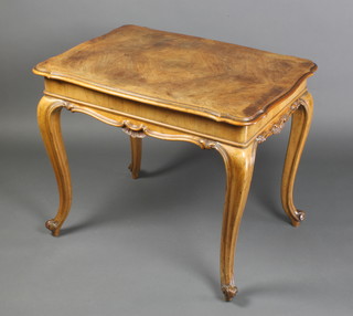 A French Kingwood rectangular occasional table with quarter veneered top and shaped apron, raised on French cabriole supports 28"h x 34"w x 24"d 