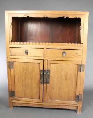 A pair of 19th Century Chinese Padouk cabinets, each fitted a recess above 2 drawers and double cupboards 57"h x 43"w x 21"d 