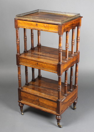 Neale, a Regency rosewood 3 tier what-not with pierced brass gallery and bobbin turned decoration to the side, fitted 3 drawers, raised on turned supports, labelled Neale Makers & Furnishers 47 Liquorpond St London 44"h x 20 1/2"w x 17"d 