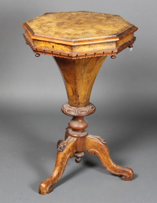 A Victorian figured walnut work table of conical form with quarter veneered top, raised on carved cabriole supports 29"h x 19"w x 19"d