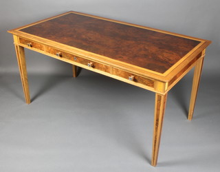 David Linley, a side table, the figured walnut top crossbanded in satinwood and mahogany, fitted 1 long and 2 short drawers, raised on square tapered supports, with stamped makers mark  29 1/2"h x 59"w x 31 1/2"d 