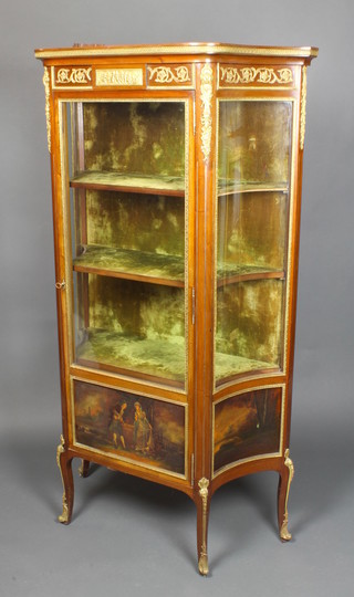 A Louis Cannes style walnut vitrine of serpentine outline with gilt metal mounts throughout, fitted shelves, the base with painted panels, raised on cabriole supports 62 1/2"h x 36"w x 14 1/2"d
