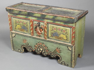 An 18th Century "Lithuanian" painted pine coffer, the interior fitted a candle box, having a panelled front painted throughout 25"h x 39"w x 142d 
