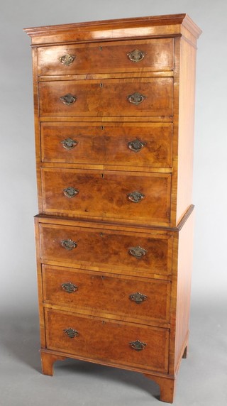 A Queen Anne style walnut chest with crossbanded top and moulded cornice, the base fitted 4 graduated drawers, raised on bracket feet 59"h x 24"w x 16"d 